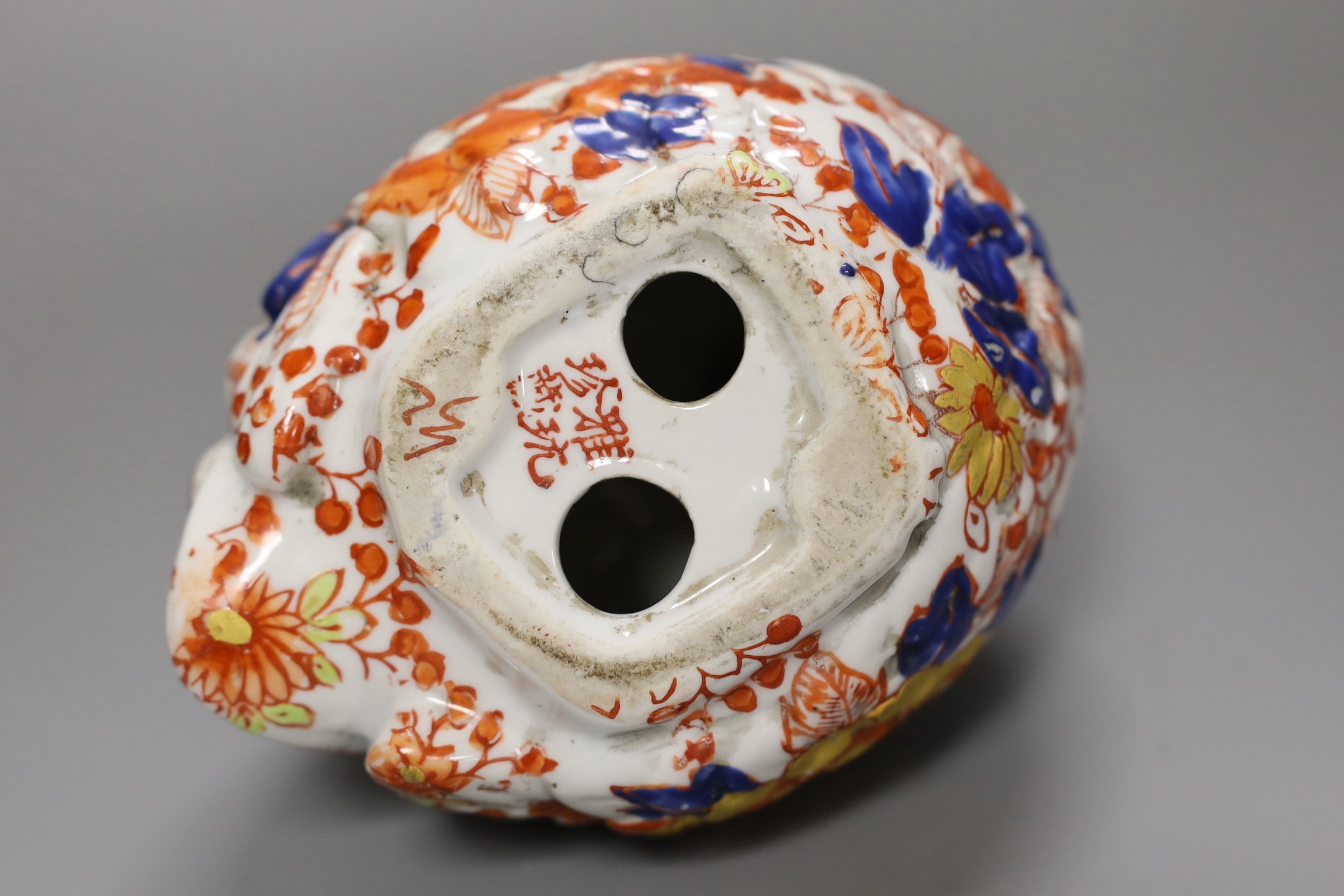 An Imari figure of a quail, signed to base. 14cm tall